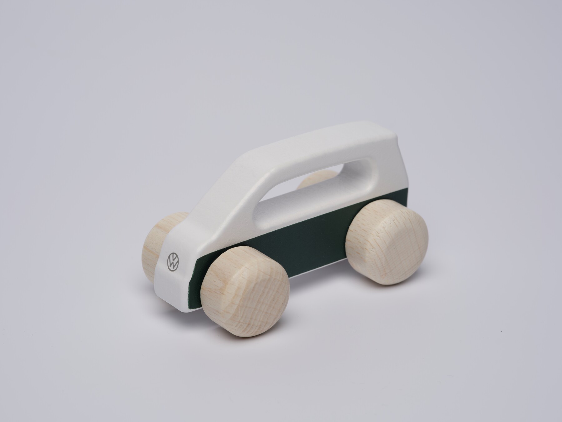 Volkswagen Spielzeugauto aus Holz, weiß/dunkelgrün